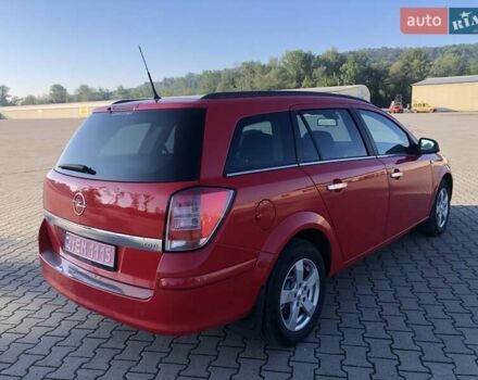 Красный Опель Астра, объемом двигателя 1.3 л и пробегом 229 тыс. км за 5990 $, фото 8 на Automoto.ua