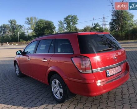 Красный Опель Астра, объемом двигателя 1.3 л и пробегом 229 тыс. км за 5990 $, фото 9 на Automoto.ua