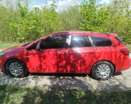Красный Опель Астра, объемом двигателя 1.2 л и пробегом 265 тыс. км за 5500 $, фото 4 на Automoto.ua