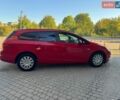 Красный Опель Астра, объемом двигателя 1.25 л и пробегом 247 тыс. км за 6700 $, фото 4 на Automoto.ua