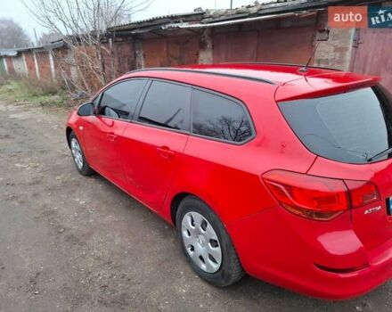 Червоний Опель Астра, об'ємом двигуна 1.4 л та пробігом 230 тис. км за 6500 $, фото 3 на Automoto.ua