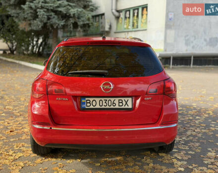 Опель Астра 2013 в Ровно на Automoto.ua Красный Опель Астра, объемом двигателя 1.7 л и пробегом 240 тыс. км за 5700 $, фото 25 на Automoto.ua