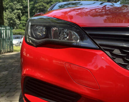 Красный Опель Астра, объемом двигателя 1.6 л и пробегом 196 тыс. км за 9999 $, фото 4 на Automoto.ua