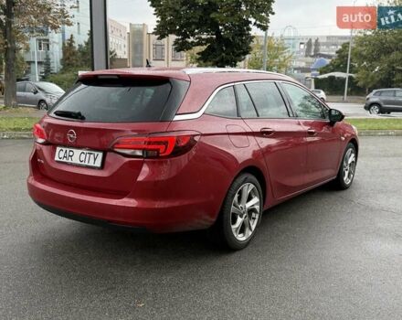 Красный Опель Астра, объемом двигателя 1.5 л и пробегом 174 тыс. км за 15300 $, фото 6 на Automoto.ua