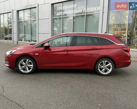 Красный Опель Астра, объемом двигателя 1.5 л и пробегом 174 тыс. км за 15300 $, фото 3 на Automoto.ua