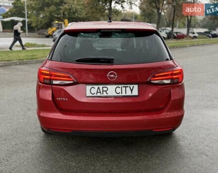 Красный Опель Астра, объемом двигателя 1.5 л и пробегом 174 тыс. км за 15300 $, фото 5 на Automoto.ua
