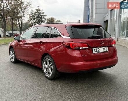 Красный Опель Астра, объемом двигателя 1.5 л и пробегом 174 тыс. км за 15300 $, фото 4 на Automoto.ua