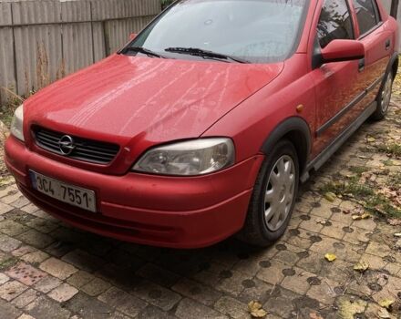 Красный Опель Астра, объемом двигателя 1.4 л и пробегом 249 тыс. км за 1500 $, фото 1 на Automoto.ua