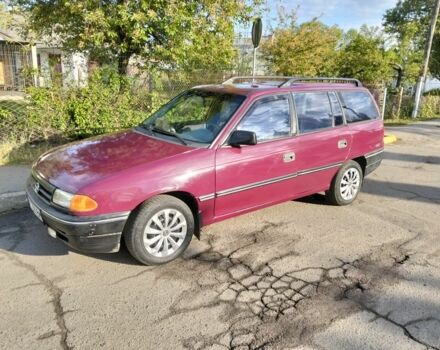 Красный Опель Астра, объемом двигателя 1.6 л и пробегом 341 тыс. км за 1500 $, фото 1 на Automoto.ua