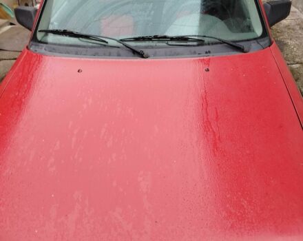 Красный Опель Астра, объемом двигателя 1.4 л и пробегом 40 тыс. км за 600 $, фото 1 на Automoto.ua