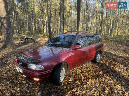 Красный Опель Астра, объемом двигателя 1.7 л и пробегом 413 тыс. км за 2450 $, фото 1 на Automoto.ua