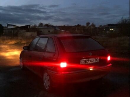 Красный Опель Астра, объемом двигателя 1.4 л и пробегом 444 тыс. км за 550 $, фото 1 на Automoto.ua