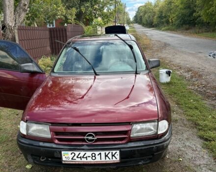 Красный Опель Астра, объемом двигателя 1.6 л и пробегом 190 тыс. км за 1205 $, фото 1 на Automoto.ua