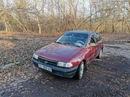 Красный Опель Астра, объемом двигателя 1.4 л и пробегом 350 тыс. км за 1700 $, фото 1 на Automoto.ua
