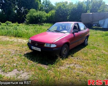 Красный Опель Астра, объемом двигателя 1.4 л и пробегом 220 тыс. км за 1000 $, фото 1 на Automoto.ua