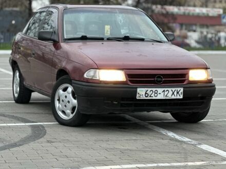 Красный Опель Астра, объемом двигателя 1.6 л и пробегом 400 тыс. км за 1299 $, фото 1 на Automoto.ua