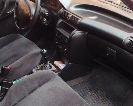 Червоний Опель Астра, об'ємом двигуна 1.8 л та пробігом 431 тис. км за 2000 $, фото 1 на Automoto.ua