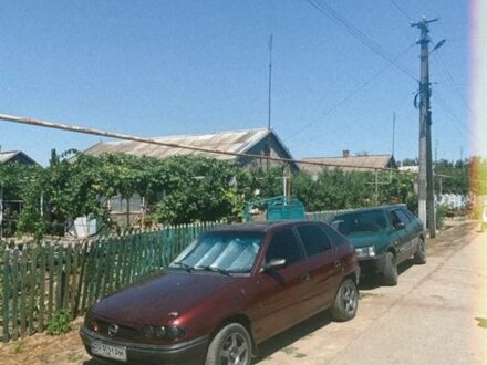 Красный Опель Астра, объемом двигателя 1.6 л и пробегом 400 тыс. км за 550 $, фото 1 на Automoto.ua