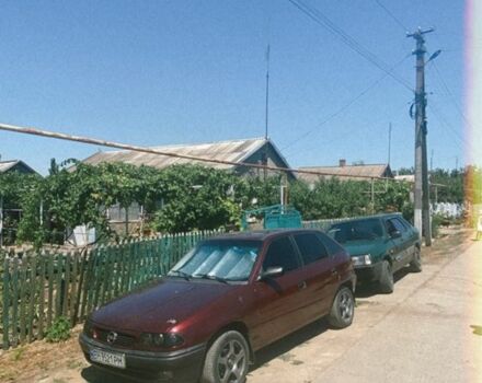 Красный Опель Астра, объемом двигателя 1.6 л и пробегом 400 тыс. км за 550 $, фото 1 на Automoto.ua