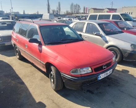 Красный Опель Астра, объемом двигателя 1.4 л и пробегом 215 тыс. км за 900 $, фото 1 на Automoto.ua