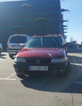 Красный Опель Астра, объемом двигателя 1.39 л и пробегом 500 тыс. км за 1500 $, фото 1 на Automoto.ua