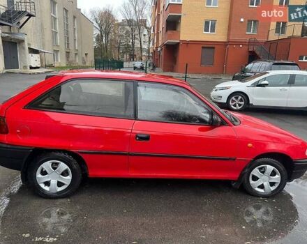 Красный Опель Астра, объемом двигателя 1.4 л и пробегом 200 тыс. км за 1900 $, фото 1 на Automoto.ua