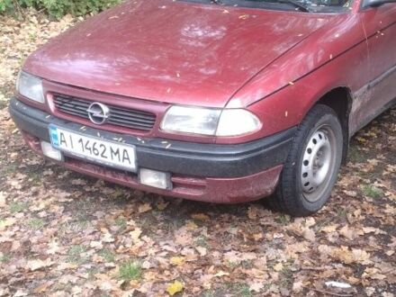 Красный Опель Астра, объемом двигателя 1.4 л и пробегом 257 тыс. км за 1097 $, фото 1 на Automoto.ua