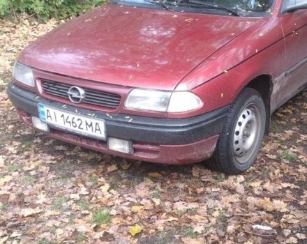 Красный Опель Астра, объемом двигателя 1.4 л и пробегом 257 тыс. км за 1097 $, фото 1 на Automoto.ua