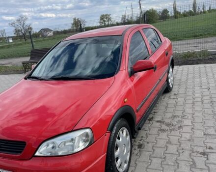 Красный Опель Астра, объемом двигателя 1.4 л и пробегом 254 тыс. км за 1714 $, фото 1 на Automoto.ua