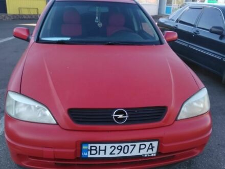 Червоний Опель Астра, об'ємом двигуна 1.6 л та пробігом 250 тис. км за 2600 $, фото 1 на Automoto.ua