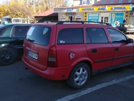 Червоний Опель Астра, об'ємом двигуна 1.6 л та пробігом 250 тис. км за 2600 $, фото 1 на Automoto.ua