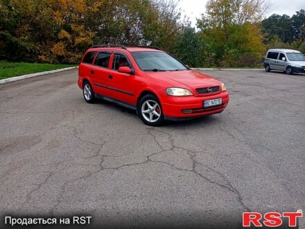 Красный Опель Астра, объемом двигателя 1.6 л и пробегом 300 тыс. км за 2550 $, фото 1 на Automoto.ua