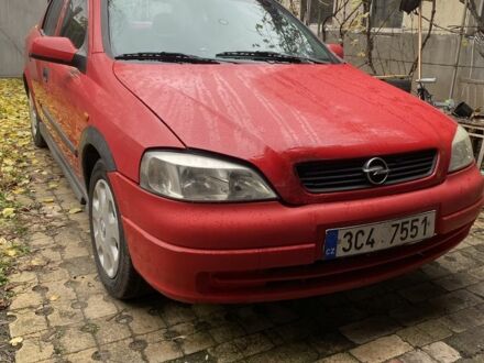 Красный Опель Астра, объемом двигателя 1.4 л и пробегом 249 тыс. км за 1500 $, фото 1 на Automoto.ua