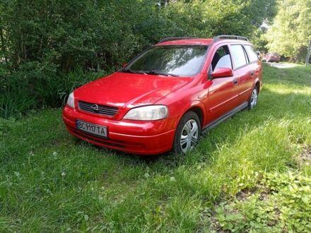 Красный Опель Астра, объемом двигателя 2 л и пробегом 359 тыс. км за 2400 $, фото 1 на Automoto.ua