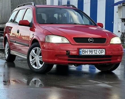 Красный Опель Астра, объемом двигателя 2 л и пробегом 250 тыс. км за 2699 $, фото 1 на Automoto.ua