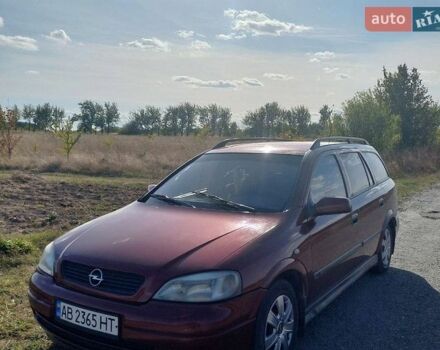 Красный Опель Астра, объемом двигателя 1.4 л и пробегом 290 тыс. км за 2200 $, фото 1 на Automoto.ua