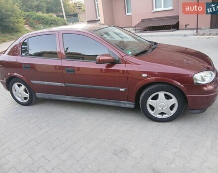 Красный Опель Астра, объемом двигателя 1.6 л и пробегом 249 тыс. км за 3500 $, фото 1 на Automoto.ua