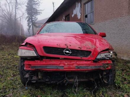 Красный Опель Астра, объемом двигателя 1.8 л и пробегом 209 тыс. км за 1700 $, фото 1 на Automoto.ua