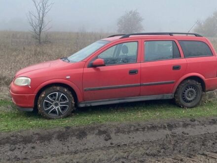 Красный Опель Астра, объемом двигателя 1.6 л и пробегом 234 тыс. км за 2500 $, фото 1 на Automoto.ua