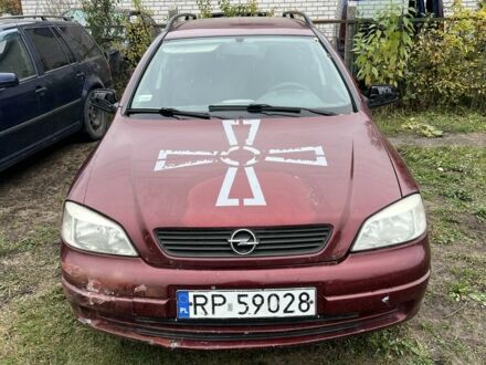 Красный Опель Астра, объемом двигателя 2 л и пробегом 200 тыс. км за 650 $, фото 1 на Automoto.ua