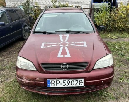 Красный Опель Астра, объемом двигателя 2 л и пробегом 200 тыс. км за 650 $, фото 1 на Automoto.ua
