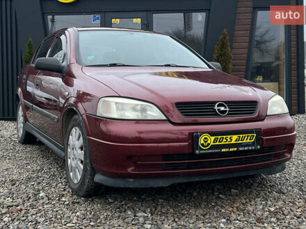 Красный Опель Астра, объемом двигателя 1.6 л и пробегом 294 тыс. км за 3699 $, фото 1 на Automoto.ua