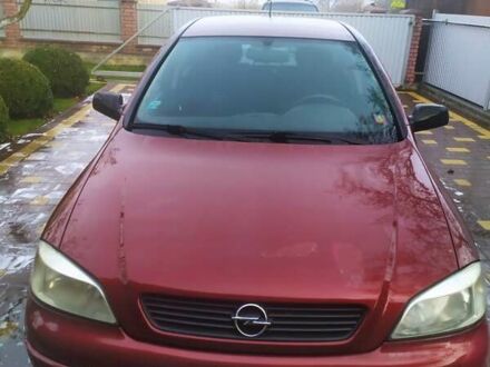 Красный Опель Астра, объемом двигателя 1.6 л и пробегом 293 тыс. км за 3250 $, фото 1 на Automoto.ua