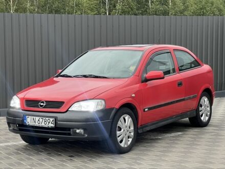 Красный Опель Астра, объемом двигателя 1.6 л и пробегом 324 тыс. км за 1500 $, фото 1 на Automoto.ua