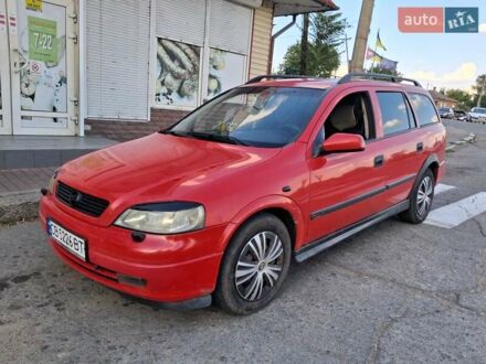Красный Опель Астра, объемом двигателя 1.8 л и пробегом 300 тыс. км за 2450 $, фото 1 на Automoto.ua