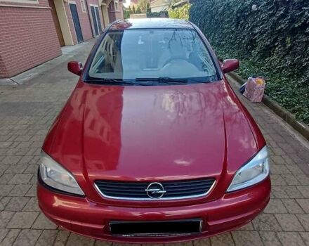 Красный Опель Астра, объемом двигателя 1.5 л и пробегом 312 тыс. км за 2520 $, фото 1 на Automoto.ua