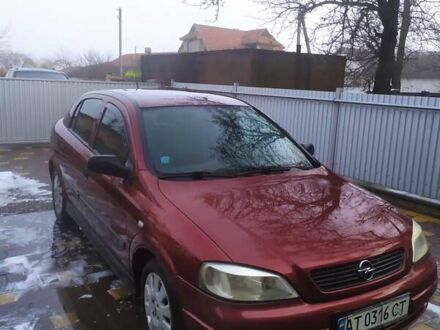 Красный Опель Астра, объемом двигателя 1.6 л и пробегом 294 тыс. км за 3250 $, фото 1 на Automoto.ua