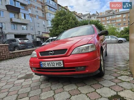 Красный Опель Астра, объемом двигателя 1.6 л и пробегом 340 тыс. км за 2999 $, фото 1 на Automoto.ua
