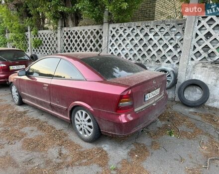 Красный Опель Астра, объемом двигателя 2.2 л и пробегом 250 тыс. км за 1000 $, фото 1 на Automoto.ua