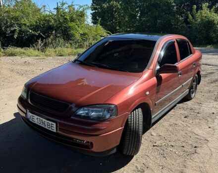 Красный Опель Астра, объемом двигателя 1.6 л и пробегом 309 тыс. км за 4800 $, фото 1 на Automoto.ua